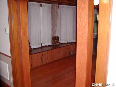 Dining Room. Built in window seat with storage, ha