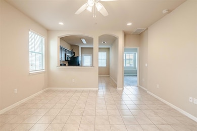 Unfurnished room featuring a ceiling fan, recesse