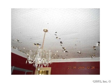 Dining Room. TIN CEILING NEED WORK