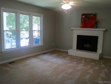 Great room w/cozy wood burning fireplace & updated