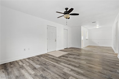 Unfurnished living room with light hardwood / wood