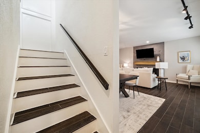 Kitchen and Living downstairs with bedrooms and la