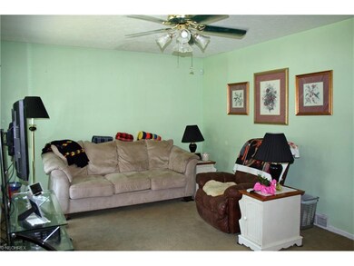 Living room with ceiling fan. House has central ai