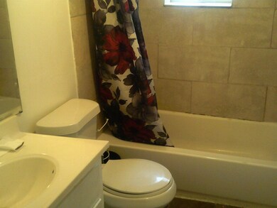 Full bathroom with vanity, toilet, and shower / tu