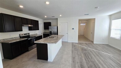 1671 Rosy Dale Cir, Davenport, FL 33837 - photo 5