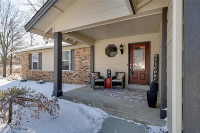 Large, covered front porch with beautiful entry do