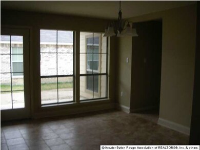 livingroom/dining room view of covered patio