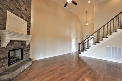 Great Room With Custom Stone Gas Fireplace