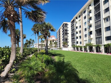 Beautifully landscaped grounds between the condo and sandy beach.