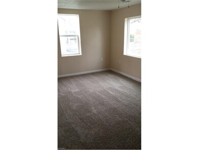 Living room with new drywall, trim, paint and carp