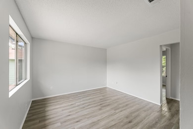Unfurnished room featuring plenty of natural ligh
