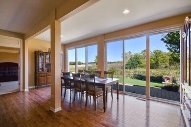 Dining room with access to rear of home. Paver pat