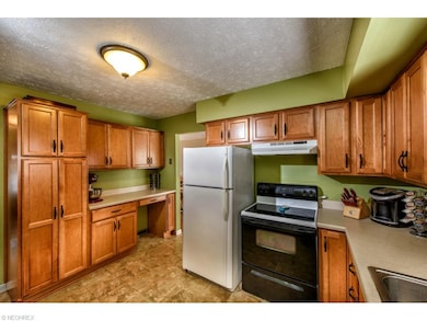 Another view of the kitchen