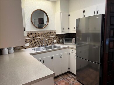 Efficient kitchen with a pantry, many cabinets, st