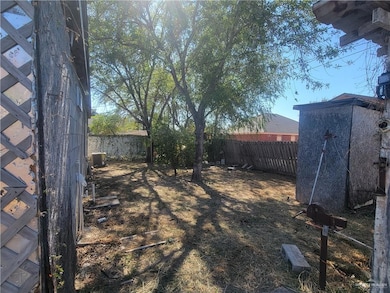 View of fenced backyard