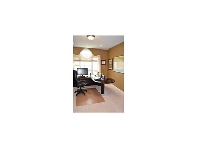 Den/Home Office. Den with French doors and wall of