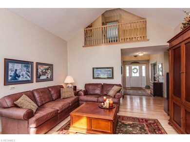 Great room with cathedral ceiling has gorgeous har