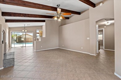 Living Room with Beam Ceilings