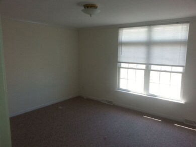 Master bedroom with large closet features on the U