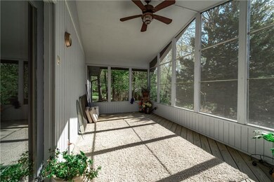 Enjoy your morning coffee on this great screened in porch.