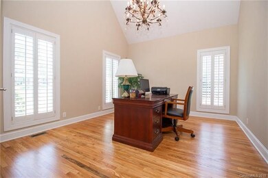 Front off with glass french doors and vaulted ceil
