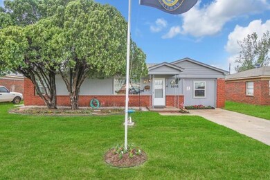 View of front of property featuring a front lawn