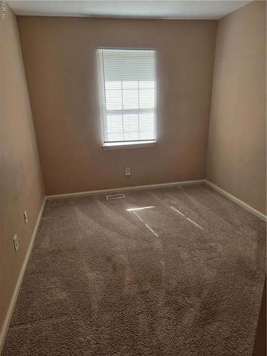 FIRST BACK BEDROOM