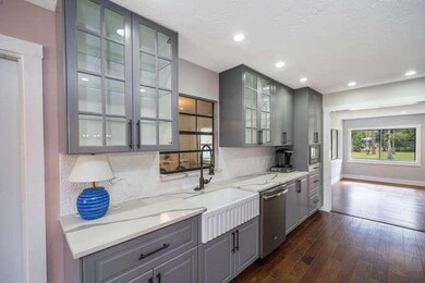 Quartz, upgraded tile and farmhouse sink
