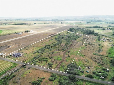 Aerial view of property's location with rural landscape
