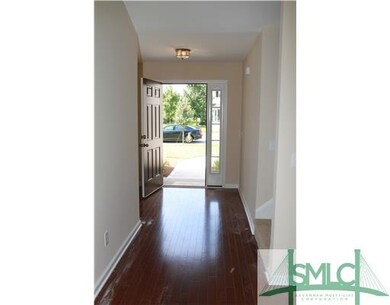 Other. Foyer entry with wood flooring, stairs to B