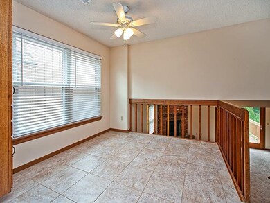 Kitchen Dining Area Overlooks Family Room.