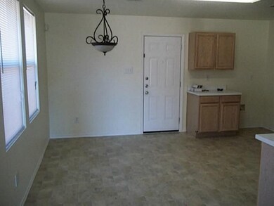 backyard entrance is off kitchen