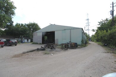 Warehouse has 16' Eave Height with sliding bay doors front and back