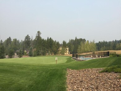 view of putting green & pool from back d