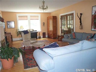 Exterior Front LIVING ROOM WITH NARROW-BOARD HARDW