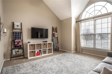 Floor-to-ceiling stacked and arched windows allow 