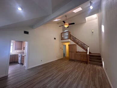 Unfurnished living room with visible vents, a cei
