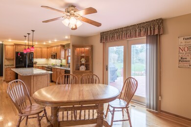 Patio doors walk out to the deck overlooking the b