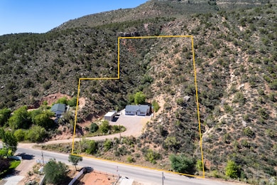 View of property location with mountains and property boundaries highlighted