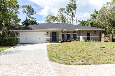 Front of home featuring new roof,  upgraded garage