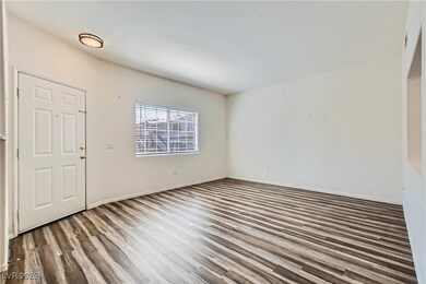 Entryway with wood finished floors and baseboards