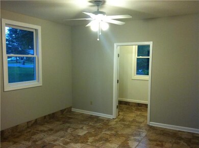 Den with new tile. Utility room just off the den.