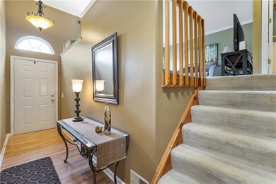 Pretty entry with steps up to main floor