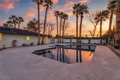 Pool at dusk with central air condition unit, a pa
