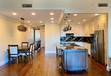 Kitchen and dining area, featuring appliances with