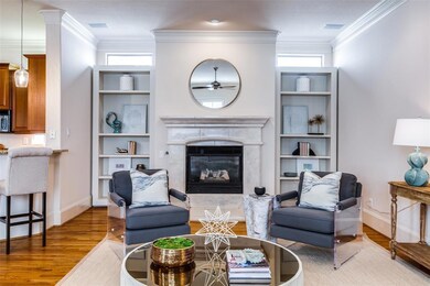 Beautiful gas fireplace framed with two walls of a