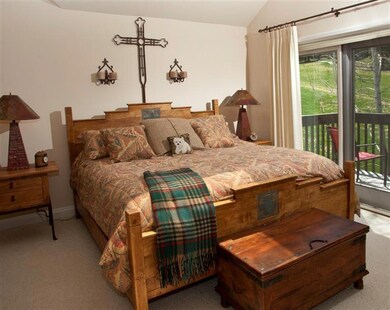 The master bedroom has a private deck an