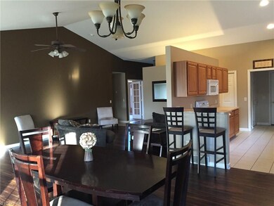 Kitchen features breakfast bar area