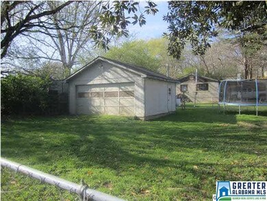 FENCED IN YARD WITH GARAGE