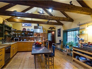 Kitchen. Cathedral ceilings and wide...